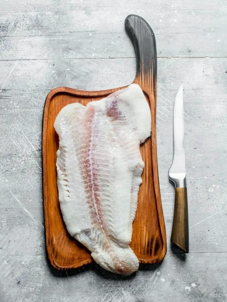 Couteau à filet et poisson