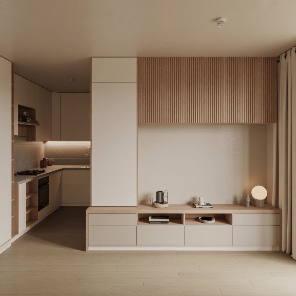 Cuisine et salon minimalistes modernes avec armoires en bois clair et blanches, appareils électroménagers intégrés, étagères ouvertes et une console basse avec des objets décoratifs et une lampe sphérique lumineuse.